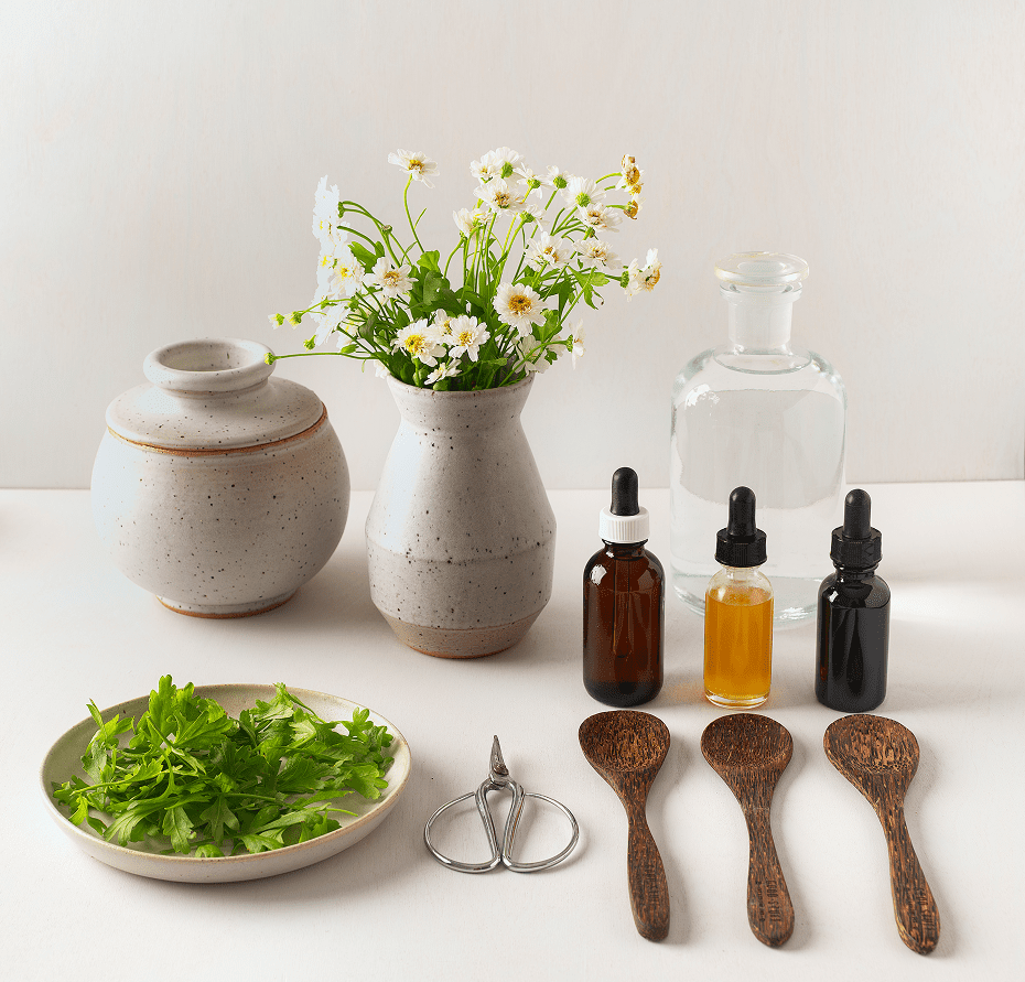 Herbal remedies with flowers and essential oils.